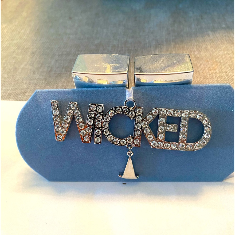 Just in time for WICKED.  This rhinestone ornament can be used to hang anywhere.